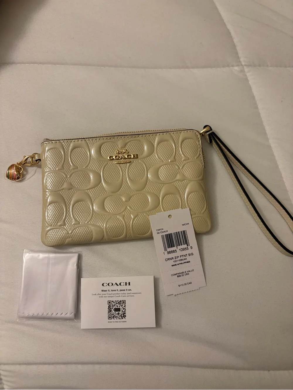 Coach Cream Patent Embossed Signature Wristlet